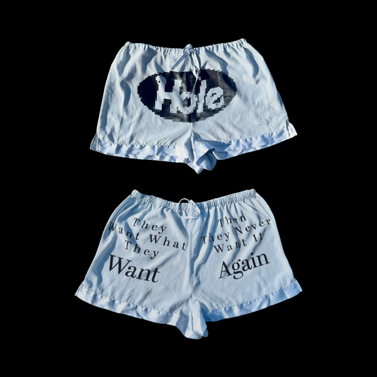 “HOLE” printed shorts